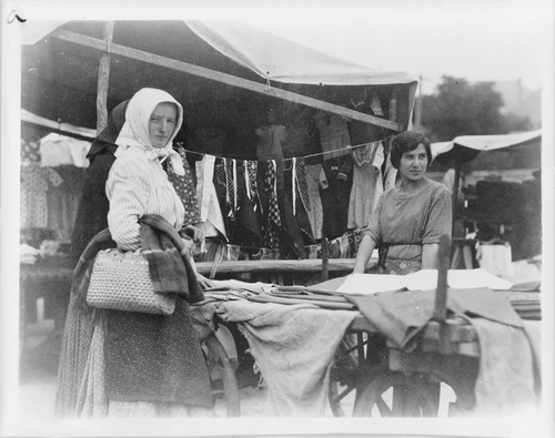 FIGURE 2 This example from the Carpenter Collection shows a woman shopping for textiles at a market in Hungary in 1923, http://hdl.loc.gov/loc.pnp/cph.3c13795.