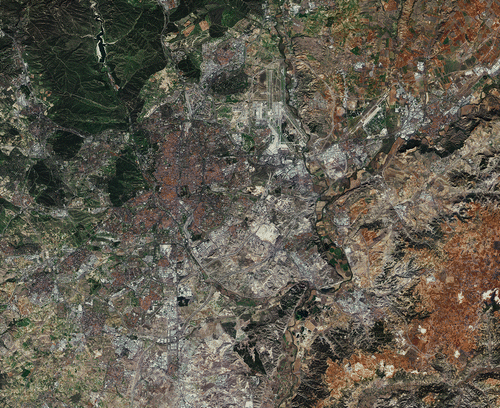 Figure 1. Madrid, Spain. EO is useful to show land change over time (Copyright: Copernicus sentinel data, 2015, European Space Agency (ESA)).