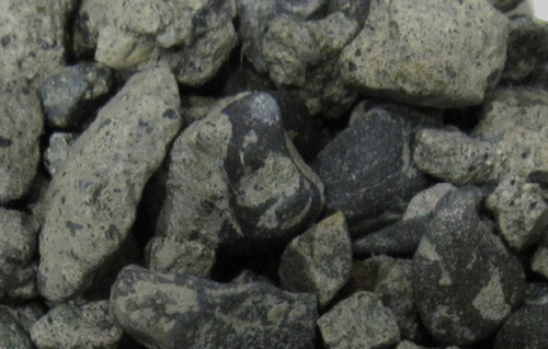 Figure 1 Low-grade recycled aggregates showing residual mortar.