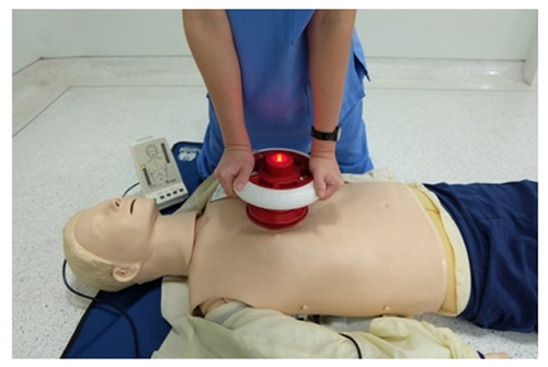 Figure 1 CPR RsQ Assist Device (CPR RAD) used for chest compression.