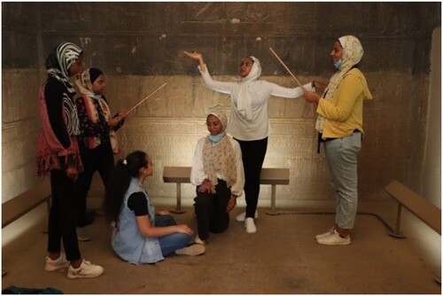 Figure 2. Participants practicing embodying the story of Osiris, Isis, Horus. Photo by Gamal Megly.