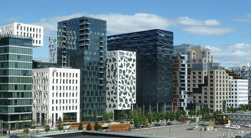 Figure 6. The buildings and public spaces of Bjørvika reflect the public/private delivery model that gave the municipality an inside seat on all key decisions. Here the distinctive barcode buildings that featured in an early development phase (image Matthew Carmona).
