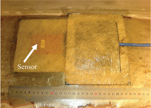 Figure 2. Sensor, being glued to the deck panel’s stiffener web (Storhaug & Moe, Citation2007).