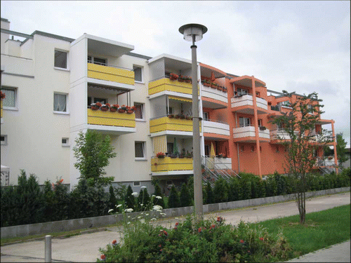 Fig. 2. An example of a former high-rise apartment building on Ahrensfelder Street in northern Marzahn after the removal of the top seven floors and an addition of new balconies through the program Urban Redevelopment East. Photo by author.