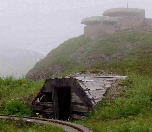 Figure 1.  Abandoned World War II bunker and gunmount, Unalaska 2002.