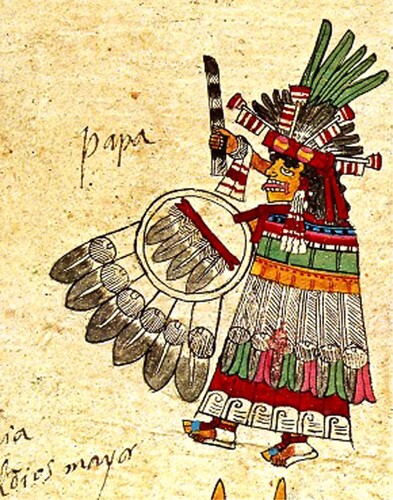 Figure 4. Cihuacoatl holding shield and weaving batten, from the Codex Borbonicus, f. 23, c.1520 [FAMSI, via Wikipedia Commons].