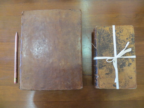 FIGURE 3 The book on the left is the original 1732 Leiden edition of the Elementa, the book on the right is the translated and abbreviated 1732 London edition of the same book.