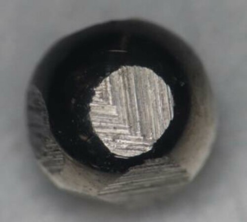 Figure 10. Microphotograph of the damage on the ball bearing element.