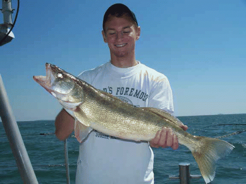 A successful Lake Erie Walleye angler. Photo credit: Ohio Sea Grant.