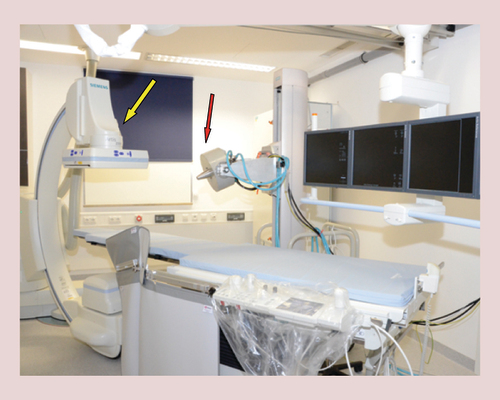 Figure 8. Preclinical operation theater at the Section Of Experimental Oncology And Nanomedicine facilities.Section of Experimental Oncology and Nanomedicine has established a preclinical operation theater with an electromagnet (red arrow) that is adjustable in all three room directions (magnetic field parameters at the tip of the poleshoe: max. field strength: 1 T; max. field gradient: 72 T/m) and a c-arm cone beam CT (Artis zee floor, Siemens Healthcare, Forchheim, Erlangen) for angiographic imaging (yellow arrow).