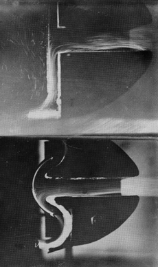 FIG. 18 (upper) Streak photographs of 30 μm particles in a swinging impactor with a wind speed of 4 mph. Note the deposition of particles under gravity in the inlet and by impaction from the flow spilling off the impaction plate. (lower) Swinging impactor with two-stage hemispherical impaction plates. (CitationMay 1982) [Reprinted from Journal of Aerosol Science, Vol. 13, K. May, A Personal Note on the History of the Cascade Impactor, 37–47, Copyright 1982, with permission from Elsevier].