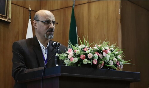 Figure 1. Professor Ebrahim Ghasemi-Nejad giving a speech at the 20th Iranian Geological Symposium, University of Tehran, Iran. Source: Professor Ghasemi-Nejad's family.