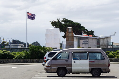 Figure 1. Freedom camping van with self-containment sticker on New Brighton waterfront.