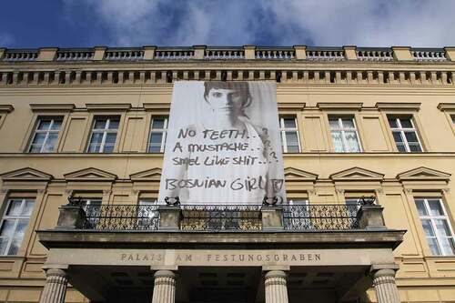 Figure 3. Šejla Kamerić’s photographic banner Bosnian Girl (2003) installed above the entrance to Palais am Festungsgraben, the main venue of the art exhibition of the 4. Berliner Herbstsalon (2019). © Galerie Tanja Wagner, Berlin. Photo: Lutz Knospe