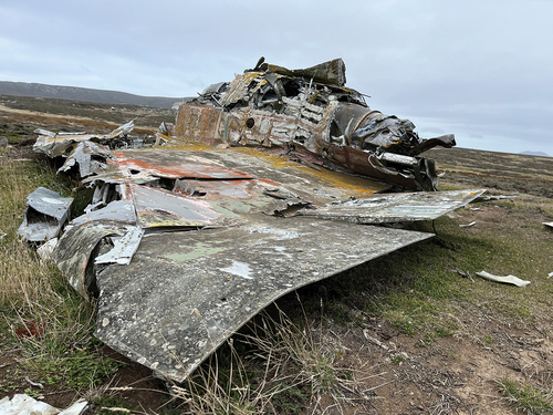 Figure 20. Wreck of downed Argentine dagger aircraft. The characteristic swept-back wings and fuselage are clearly visible.