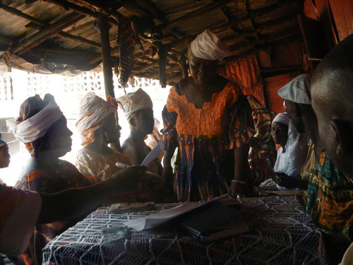 Figure 1. Sowei council members in a meeting held at a Freetown “Bondo bush”.