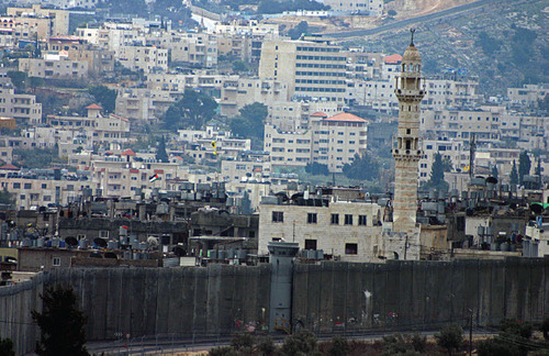 Figure 12: Looking into Bethlehem, Palestine, 2005 The International Court of Justice has found this structure to be illegal based on the Fourth Geneva Convention, a treaty on the treatment of civilians living in war zones.