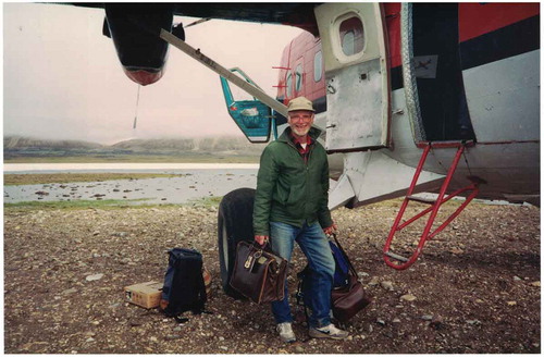 Figure 2. Professor L. C. Bliss boarding the Twin Otter plane at the Truelove Lowland, Devon Island, Canada (July 1993). Photo courtesy of Karen Demaree, daughter of Lawrence C. Bliss.