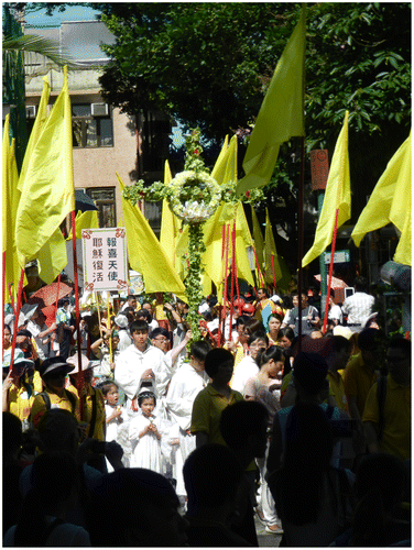 Figure 1. Every spring, Catholics from all over Hong Kong travel to Cheung Chau Island to join in the procession in honour of the holy cross and our Lady of Fatima. The procession commemorates the Virgin Mary appearing to three shepherd children in Fátima (Portugal) in 1917. Photograph by author.