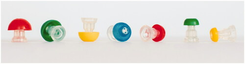 Figure 4. SnapPROBE™ ear tips modified with coloured “mushroom” parts for the purpose of fitting the infant ear tips to the adult test subjects in the study.