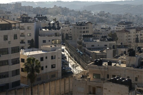 Figure 3: The Separation Wall cutting through the urban fabric (Photo: Huda Abuzaid).
