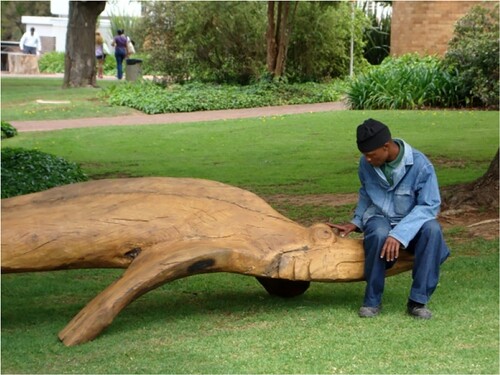 Figure 6. Thomas Kubayi. Walking Fish (detail). 2010. Wild–fig wood, 550 × 155 × 90 cm. Bloemfontein campus of the University of the Free State, South Africa. Image courtesy of the UFS Art Gallery.