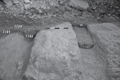 Fig. 10: Section showing soil stratified accumulation L7742 and L7742 placed inside the channels and sealed by surface L7724, looking south (photo by Oscar Bejarano, courtesy of the GivꜤati Parking Lot Expedition)