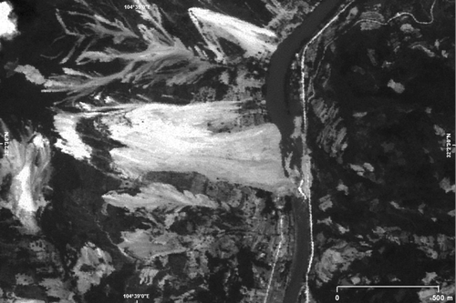 Figure 6.  Landslides interrupting roads upstream from Beichuan depicted on a SPOT-5 panchromatic image.