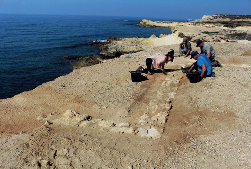 One of the Roman buildings along the Dreamer’s Bay shoreline, now partially lost to the sea, being dug by students and Operation Nightingale participants (photo: Simon James).