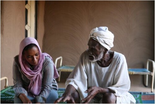 Figure 2. Abd Rabo interviewing a former EES excavation worker from Ernetta island in 2010.