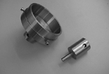 Figure 2 Unpeeled sample holder and spherical end indentor.