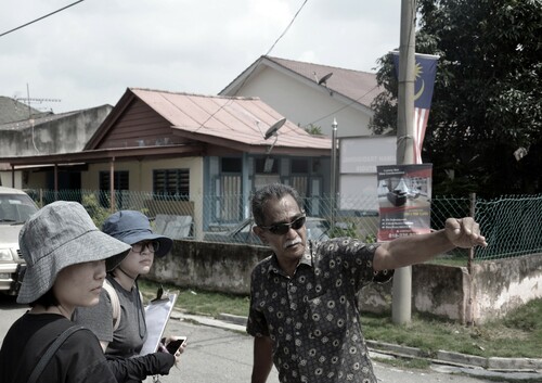 Figure 6: Martin Theseira, the spokesman for the local resistance recounts their struggle to save the land and sea. Photo: Zhuhui Bai 2017.