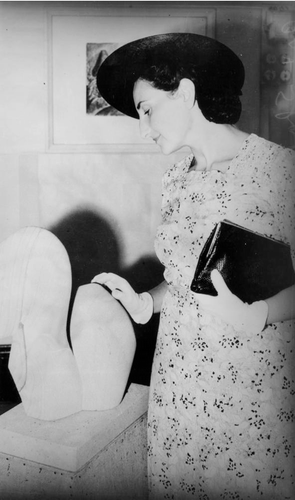Figure 1. Viennese art critic Dr Gertrude Langer inspecting a local art show, Brisbane, 1940. Image courtesy State Library of Queensland.