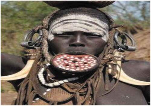 Figure 2. A Surma girl depicted going to the market (Southern Ethiopia). Source: Communicative English I, p. 42