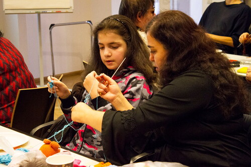 Figure 6 Sunday Pursuits at The National Museum of Denmark. Crochet skills are passed over to the next generation. December 2019. Photo: Henriette Rolf Larsen.