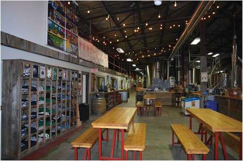 Figure 6. There is a consistency in the interior design techniques utilized across small town breweries. The Beau’s Brewery in Vankleek Hill, Ontario reflects many of the techniques used to create social exchange and to manufacture a connection to place. Photograph taken by authors.