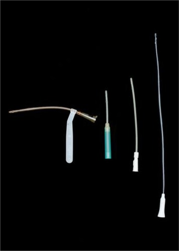Figure 1 A range of single use catheters, and a catheter holder for patients having difficulties with fine finger coordination.