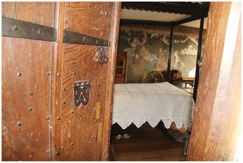 Fig. 7. View at threshold of Queen Margaret’s Chamber, Owlpen Manor, Gloucestershire, with the painted cloths visible on far wall, early eighteenth century.