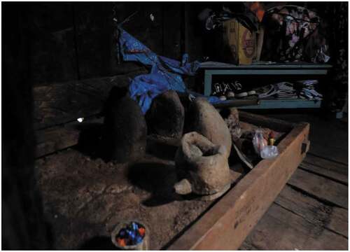 Figure 15. Stone hearth in the traditional kitchen (lombon) used for cooking and rituals.