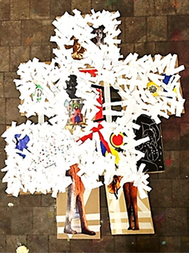 Figure 28. Gluing legs to her collage, an expression of N.’s feeling of growing roots.