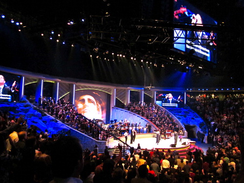 FIG 7 Toned down colours during worship phase with image projection as light source on stage. Photo by the author, 2012.