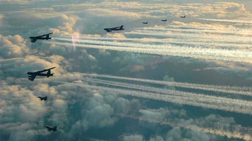 Figure 1. The US Air Force has increased bomber operations as part of a Great Power Competition strategy, with frequent flights over all areas around Russia. This image shows US B-52 bomber and Norwegian F-16 fighters over Northern Norway in November 2019 before the bombers continued into the Barents Sea near Russia’s strategic submarine base on the Kola Peninsula. (Image: US Air Force)