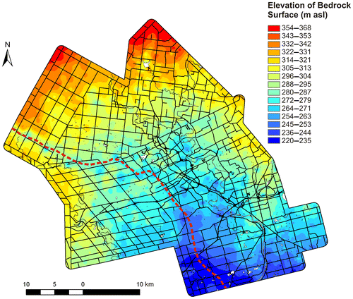 Figure 3. Topography of the bedrock surface in the Waterloo Region. The red dashed line delineates the trunk axis of the Dundas/Wellesley buried bedrock valley. asl, above sea level.