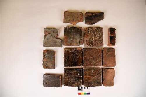 Figure 3. A selection from the several dozens of glazed tiles, which have been found from the bow sections of Metskär and Esselholm. Photo: Riikka Tevali.