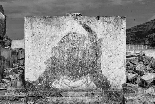 Figure 2. A hammer and sickle inscribed into a wall on El Frontón, which has later been erased. Photograph by Gladys Alvarado Jourde (Buntinx Citation2014, 35) © Gladys Alvaro Jourde.