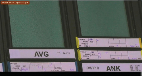 Figure 10. SWF833 is taking off (in the air, just above the runway). On the flight strip for SWF 833, the planned/predicted departure time (53) was first noted, and the actual departure time (also 53) was later noted beside the first number.