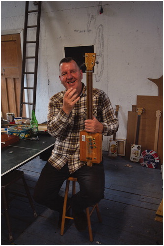 Figure 14 Dan Price with one of his first cigar box guitars.