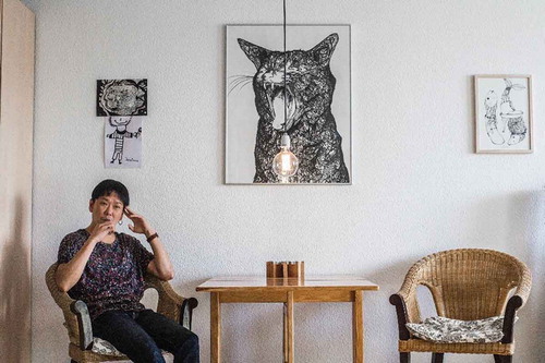 Figure 1. Nobu at home smoking his electric cigarette. Picture taken by Natalia Morokhova.