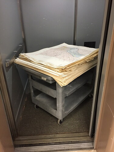 Figure 3. UT maps transported by cart on an elevator.