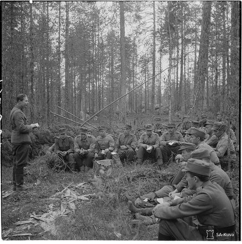 FIGURE 4 A military chaplain preaching near Uhtua, Russian Karelia. Date unknown. Source: SA-Kuva 129,561, Ministry of Defence.